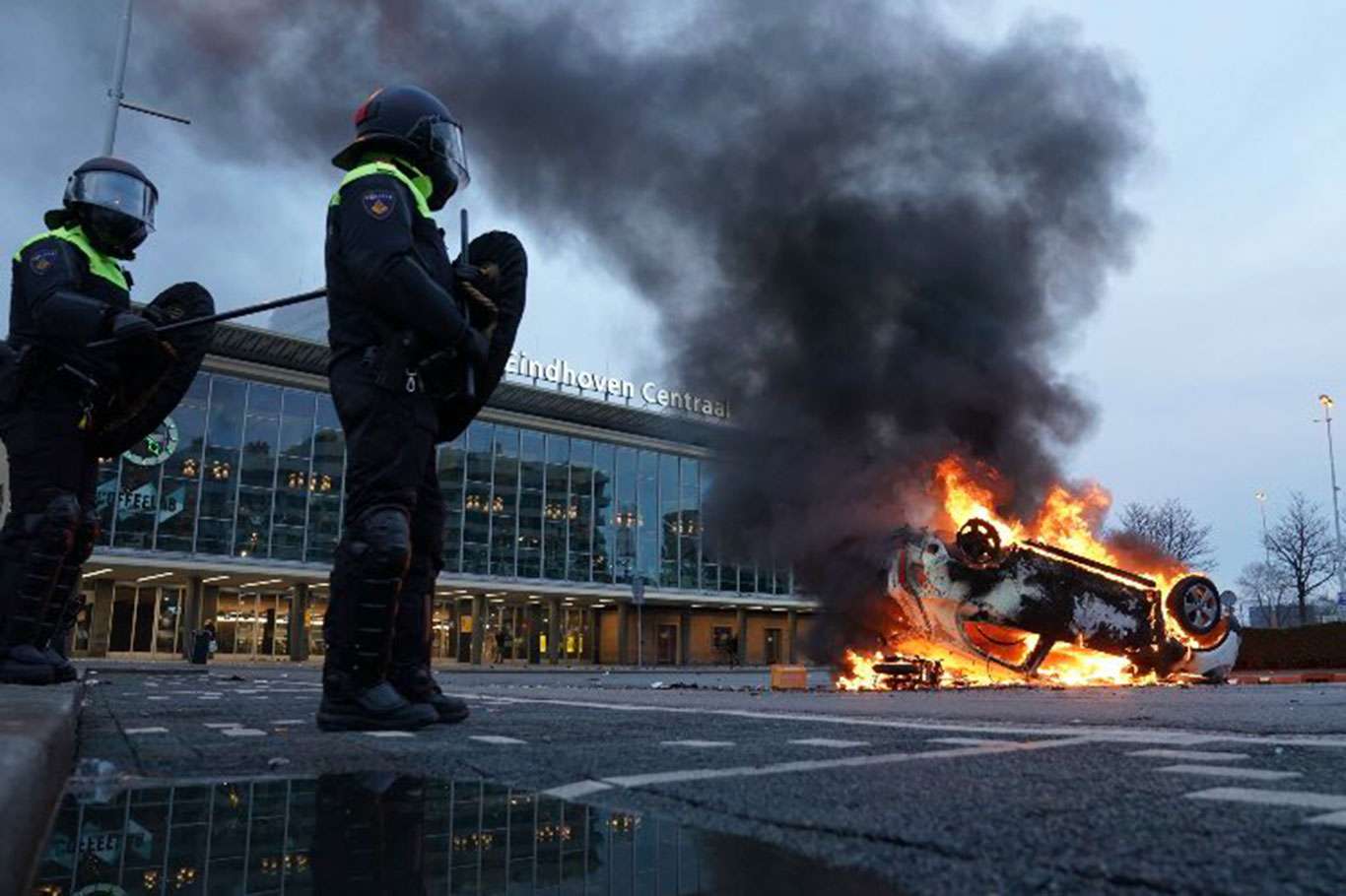 240 people detained after anti-lockdown protests turn violent in Netherlands